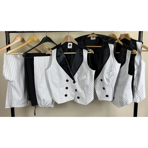 76 - 4 matching waistcoats and 3 pairs of trousers in black and white pinstripe design.