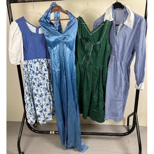 84 - 4 theatre costume dresses in blue and green tones. To include blue satin halter neck dress.