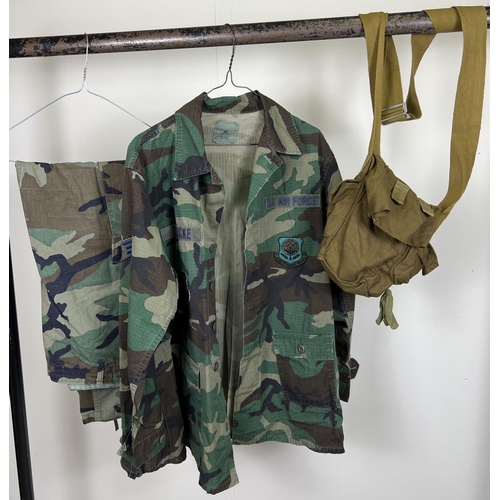 176 - A military US Air Force camouflage shirt and trousers with embroidered cloth patches. Together with ... 