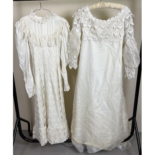 419 - 2 vintage wedding dresses. A 1960's A line dress with crochet lace to top and cuffs together with a ... 