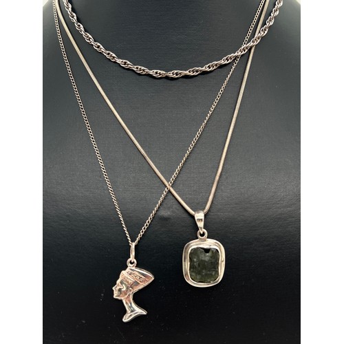 1102 - 3 silver chain necklaces, 2 with pendants. A square shaped textured glass & white metal pendant on a... 