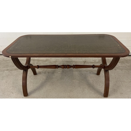 1370 - A vintage Bevan Furniture 'Reprodux' X frame coffee table with green leather insert to top.