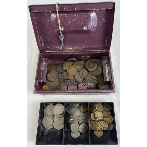 12 - A vintage metal cash tin complete with key containing a collection of British vintage coins, mostly ... 