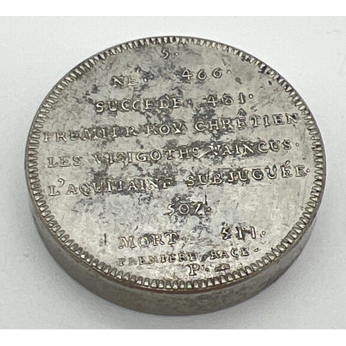 45 - A Clovis Roy De France medallion coin with inscription to reverse, in nickel finish. Approx 3.5cm di... 