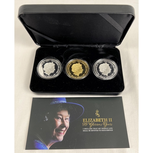 48 - A 2021 cased limited edition 3 x Soloman Islands half dollar silver and gold plated half dollar Eliz... 