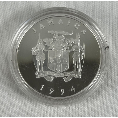 69 - A silver proof 1994 Jamaican 25 dollar coin, depicting wedding of Queen Elizabeth and Prince Philip.... 