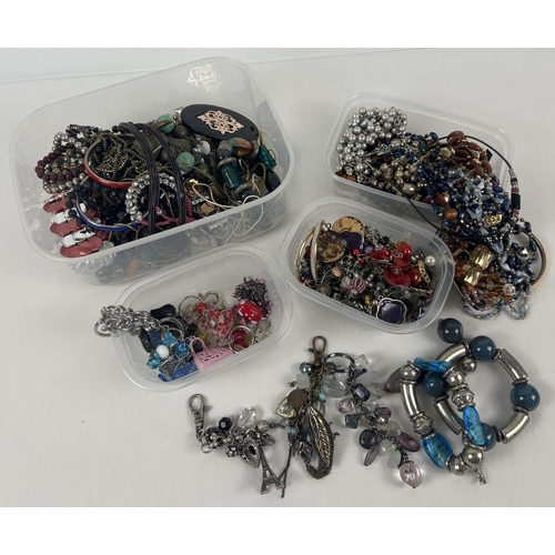 1090 - 5 tubs of assorted vintage and modern costume jewellery. To include: necklaces, bracelets, earrings ... 