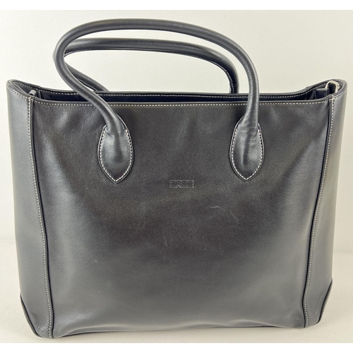 1322 - A soft black leather laptop tote work bag by Bree. Complete with detachable shoulder strap. Black le... 