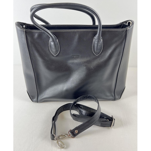 1322 - A soft black leather laptop tote work bag by Bree. Complete with detachable shoulder strap. Black le... 