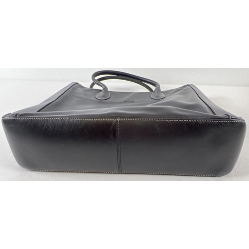 1322 - A soft black leather laptop tote work bag by Bree. Complete with detachable shoulder strap. Black le... 