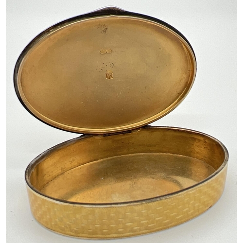 1128 - An early 20th century Marius Hammer Norwegian silver, Asprey oval shaped snuff box with yellow guill... 