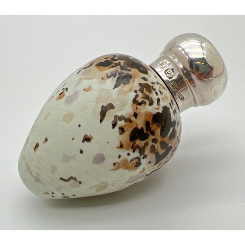 1131 - A Victorian novelty scent bottle modelled as a bird egg, with hallmarked silver lid. Porcelain pale ... 