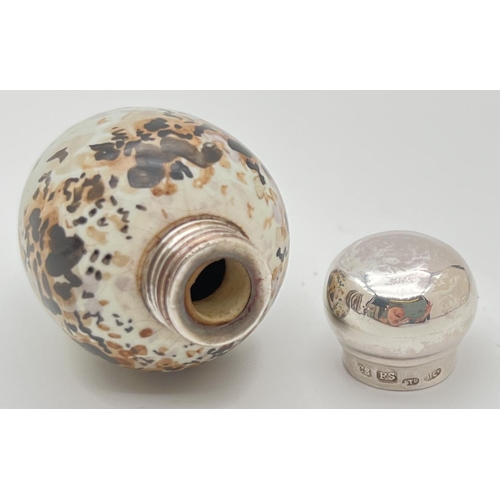 1131 - A Victorian novelty scent bottle modelled as a bird egg, with hallmarked silver lid. Porcelain pale ... 