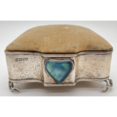 1136 - An Arts & Crafts silver jewellery box with hat-pin cushioned top, hallmarked for Chester 1906. Faded...