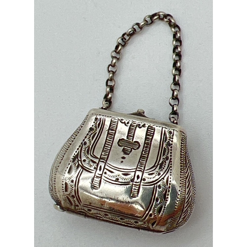 1137 - A Victorian silver novelty vinaigrette modelled as a bag/satchel with belcher chain handle. Fully ha... 