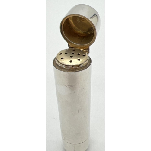 1138 - A Victorian silver cylindrical combined scent bottle and vinaigrette with hinged ends. Fully hallmar... 