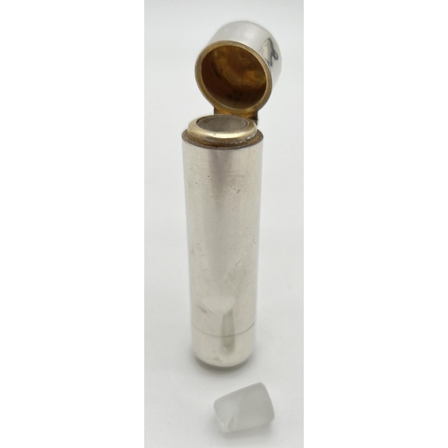 1138 - A Victorian silver cylindrical combined scent bottle and vinaigrette with hinged ends. Fully hallmar... 