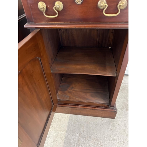 1343 - A pair of vintage mahogany bedside cabinets with brass drop handles and escutcheons. Single drawer a... 