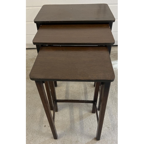 1346 - A Mid century Herbert E Gibbs dark wood nest of 3 tables. With original label to underside stamped w... 