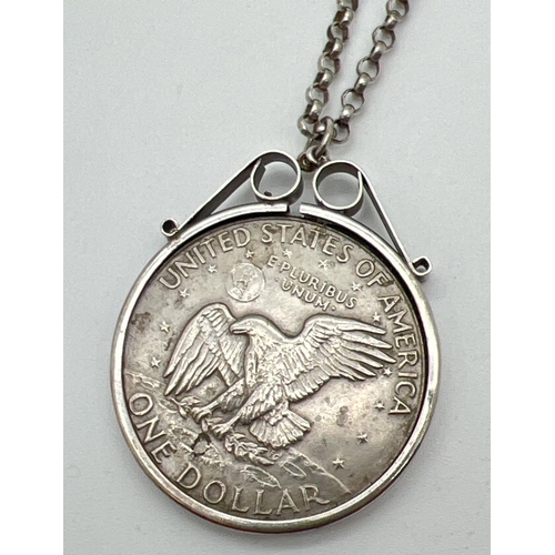 1049 - A 1974 American dollar in a silver mount. On a 22 inch silver belcher chain with spring clasp. Silve... 