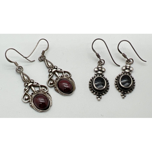 1065 - 2 pairs of drop style stone set earrings with hooked posts. One in an Art Nouveau style set with gar... 