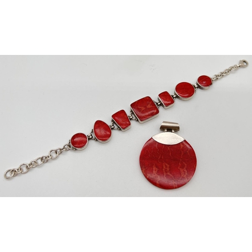 1079 - 2  pieces of modern design silver and red jasper set jewellery. A large circular pendant together wi... 