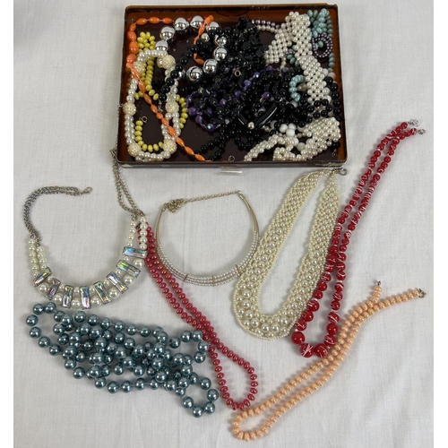 1088 - A box of vintage plastic bead and faux pearl necklaces. to include statement and collar style.