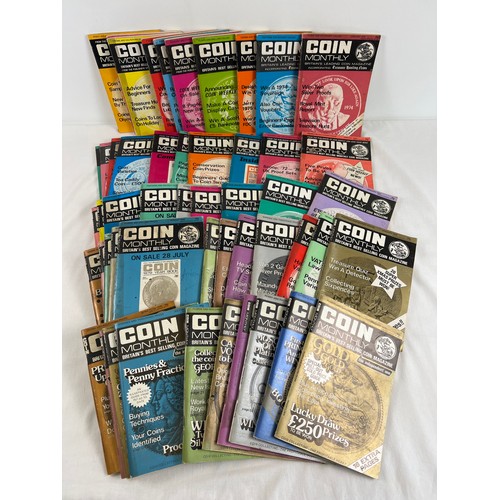 75 - 51 copies of Coin Monthly magazine dating from 1975-1979. In varying conditions.