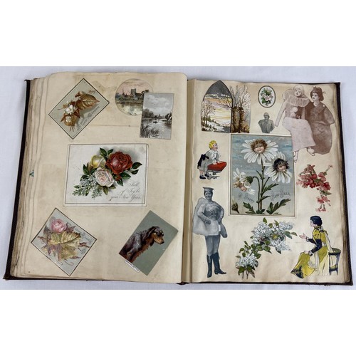 302 - A late Victorian/Edwardian scraps album containing assorted scraps & greetings cards from the era.