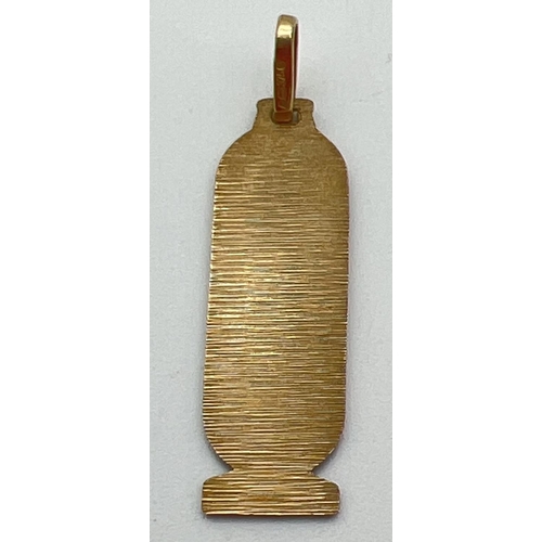 28 - A 9ct gold hieroglyph pendant with hanging bale. Gold marks to back and inside of bale. Total weight... 