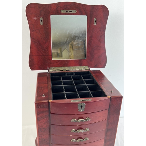 44 - A vintage wooden chest style jewellery box. 6 front opening drawers with small square compartments t... 