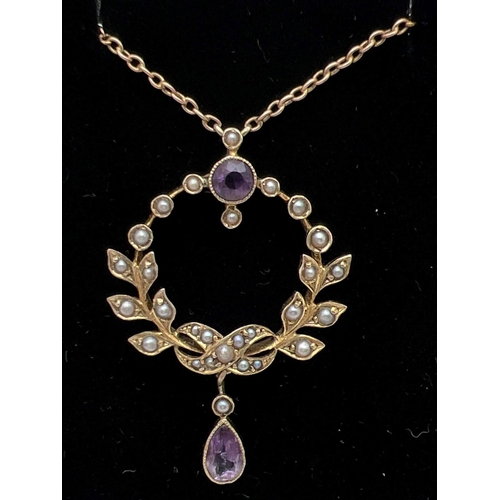 3 - An Art Nouveau 9ct gold necklace set with amethysts and seed pearls, in original silk and velvet lin... 