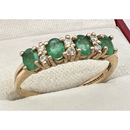 78 - A 9ct gold emerald and diamond set half eternity ring. 4 round cut emeralds with 2 small round cut d... 