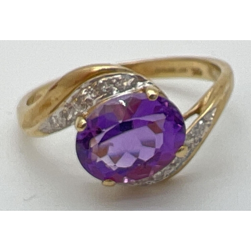 79 - A 9ct gold amethyst and diamond ring with twist design mount. A central oval cut amethyst with 5 sma... 