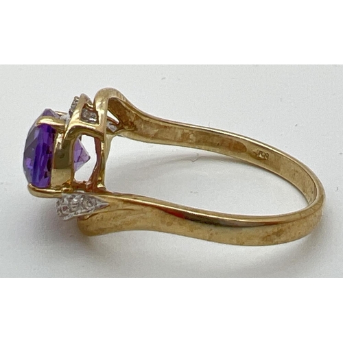 79 - A 9ct gold amethyst and diamond ring with twist design mount. A central oval cut amethyst with 5 sma... 