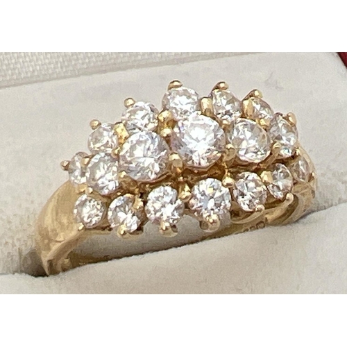 90 - A 14ct gold claw set cluster ring with 19 round cut Diamonique cubic zirconia stones. Full hallmarks... 