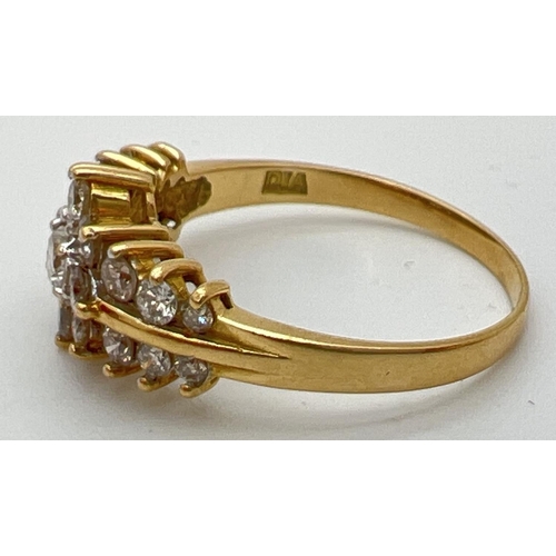 30 - An 18ct gold .70ct diamond cluster style ring. Central round cut diamond surrounded by 8 small round... 