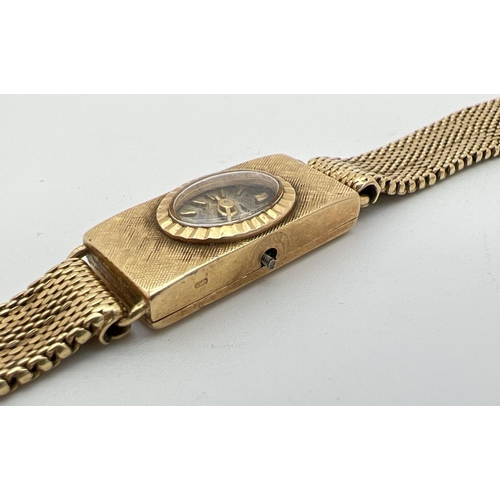 36 - A vintage 18ct gold ladies wristwatch by Cortebert. Gold case and mesh strap with hallmarks to insid... 