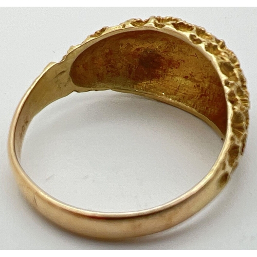 17 - A vintage 18K gold dome style ring with honeycomb design to top. Gold mark to inside of band. Size S... 