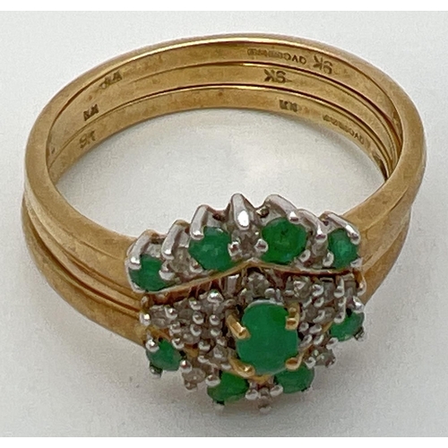 16 - A 9ct gold emerald and diamond triple ring/bridal set. Central ring set with a marquise cut emerald ... 