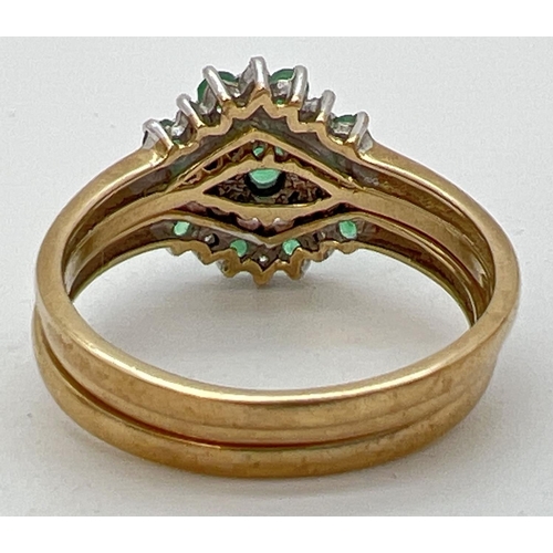 16 - A 9ct gold emerald and diamond triple ring/bridal set. Central ring set with a marquise cut emerald ... 