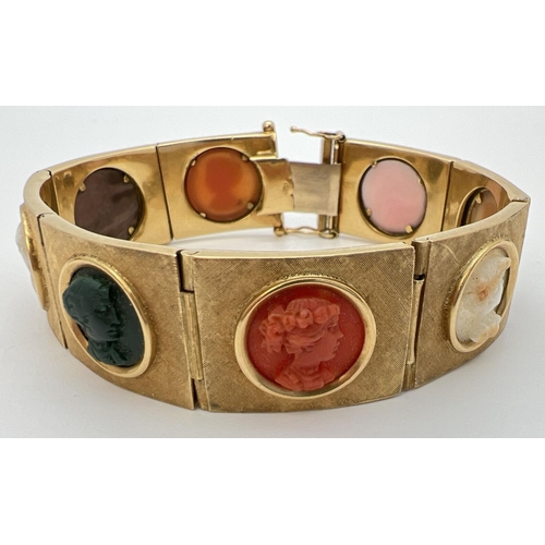 11 - A vintage 8 panel 18ct brushed gold bracelet set with varying colour semi-precious stone cameos. Pus... 