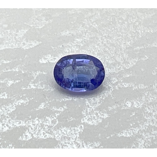 118 - A oval facet cut .50ct tanzanite stone. Suitable for jewellery making, complete with certificate.