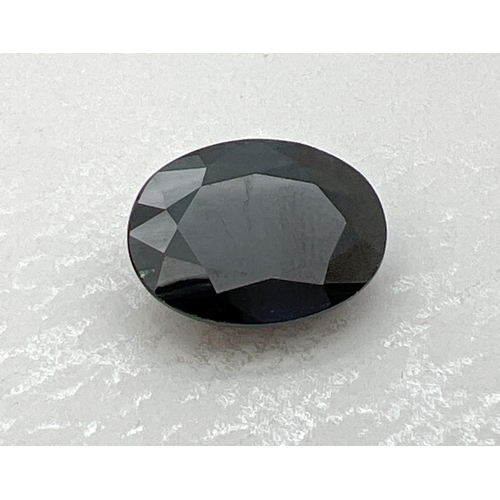 120 - An oval facet cut Midnight blue sapphire, approx. 10.20ct. Clarity - translucent. Suitable for jewel... 