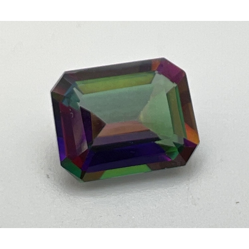 122 - A loose emerald cut mystic topaz faceted stone, suitable for jewellery making. Approx. size 10mm x 6... 