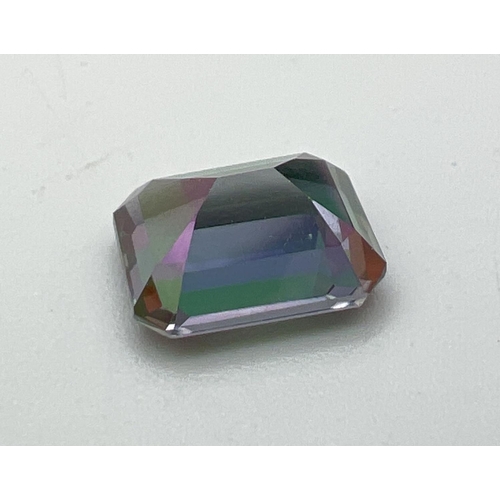 122 - A loose emerald cut mystic topaz faceted stone, suitable for jewellery making. Approx. size 10mm x 6... 