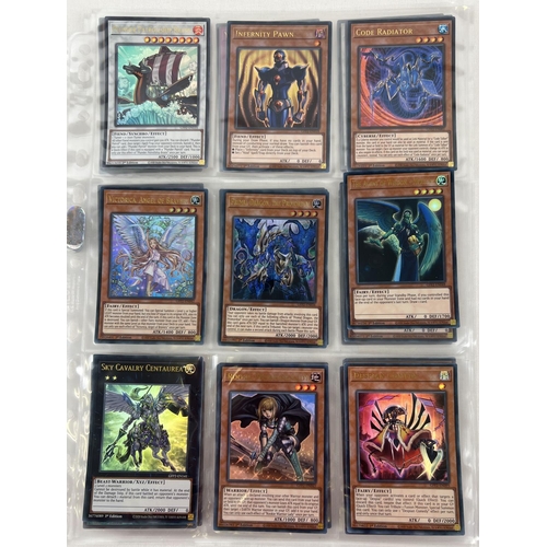 15 - Collection of Yu-Gi-Oh trading cards, toys and collectables. Comprising: 45 Ultra Rare trading cards... 