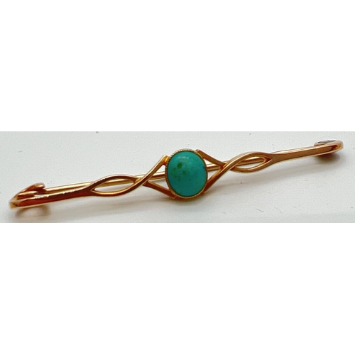 1121 - A 15ct gold twist design bar brooch set with a central turquoise cabochon. Marked 15ct to back with ... 