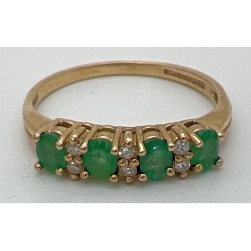 1126 - A 9ct gold emerald and diamond set half eternity ring. 4 round cut emeralds with 2 small round cut d... 