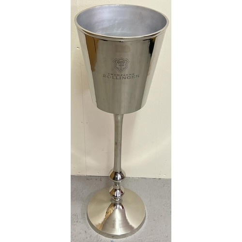 1194 - A large polished aluminium Bollinger Champagne cooler on a freestanding pedestal stand. Approx. 81cm... 